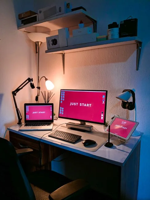 A tablet screen featuring images of minimalist decor emphasizing greenery and simple design.